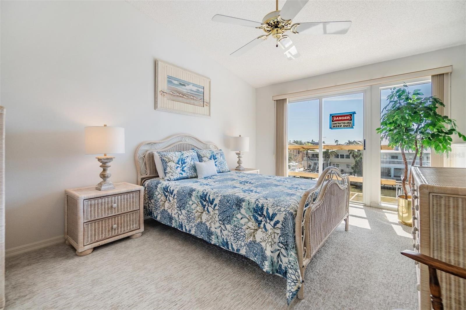 Primary bedroom with its own, private balcony!