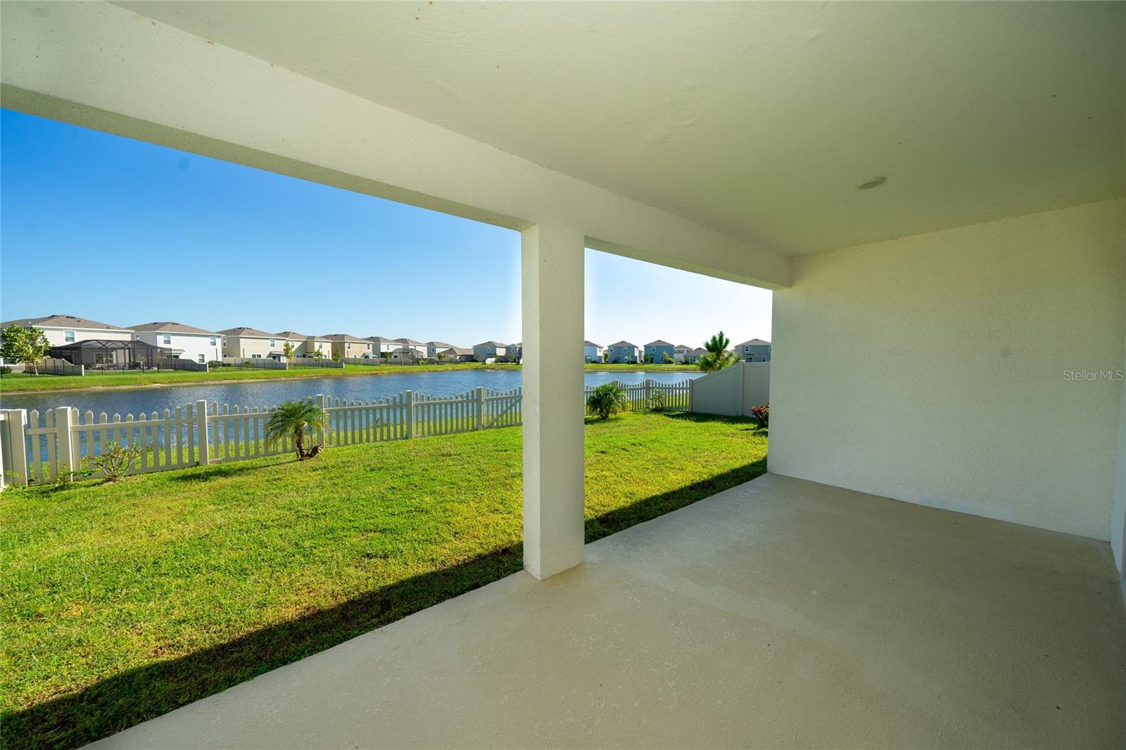 Covered Lanai and backyard view