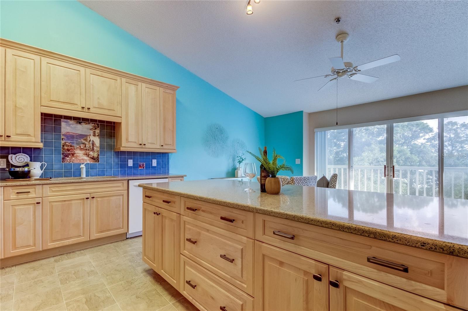 Another view of kitchen and family room.