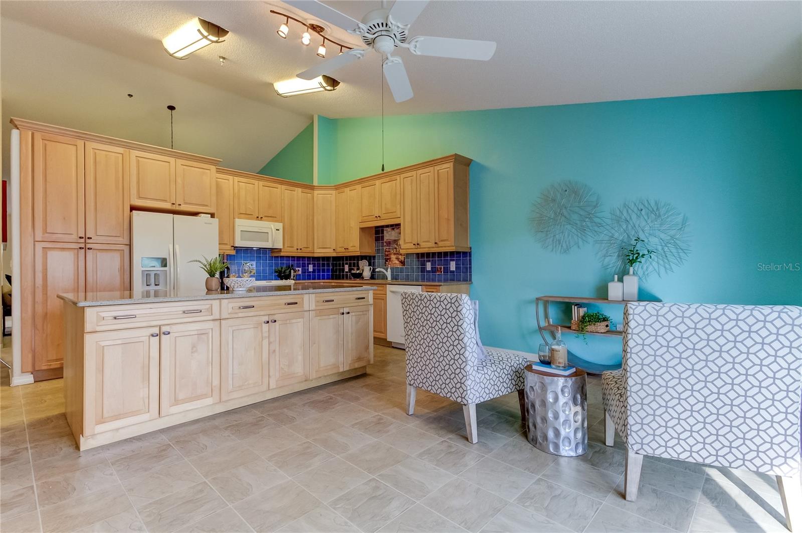 Another view of family room and kitchen.