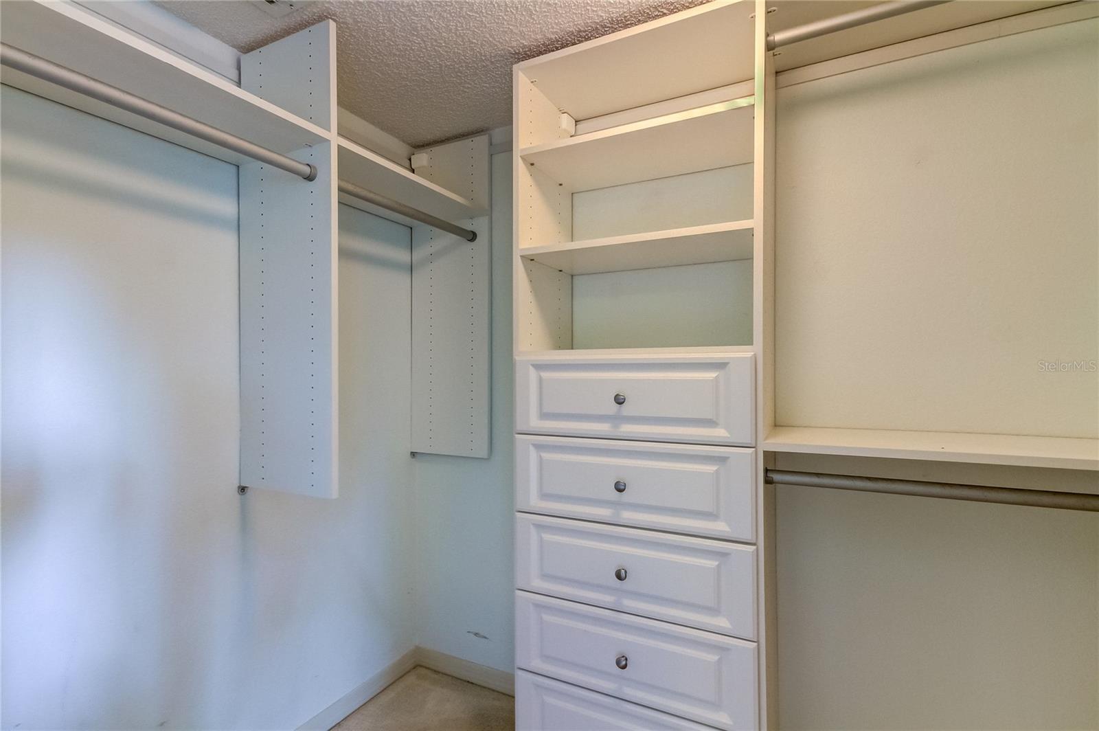 Walk in closet in Primary bedroom.