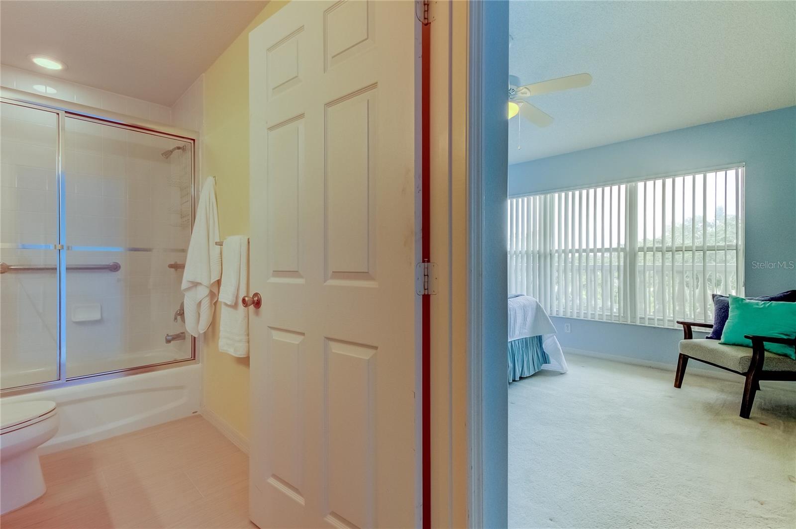 Hall bathroom looking towards second bedroom.