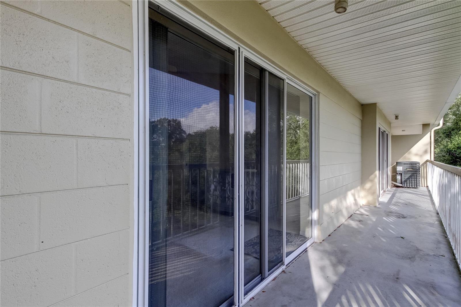 View of balcony off of primary bedroom.