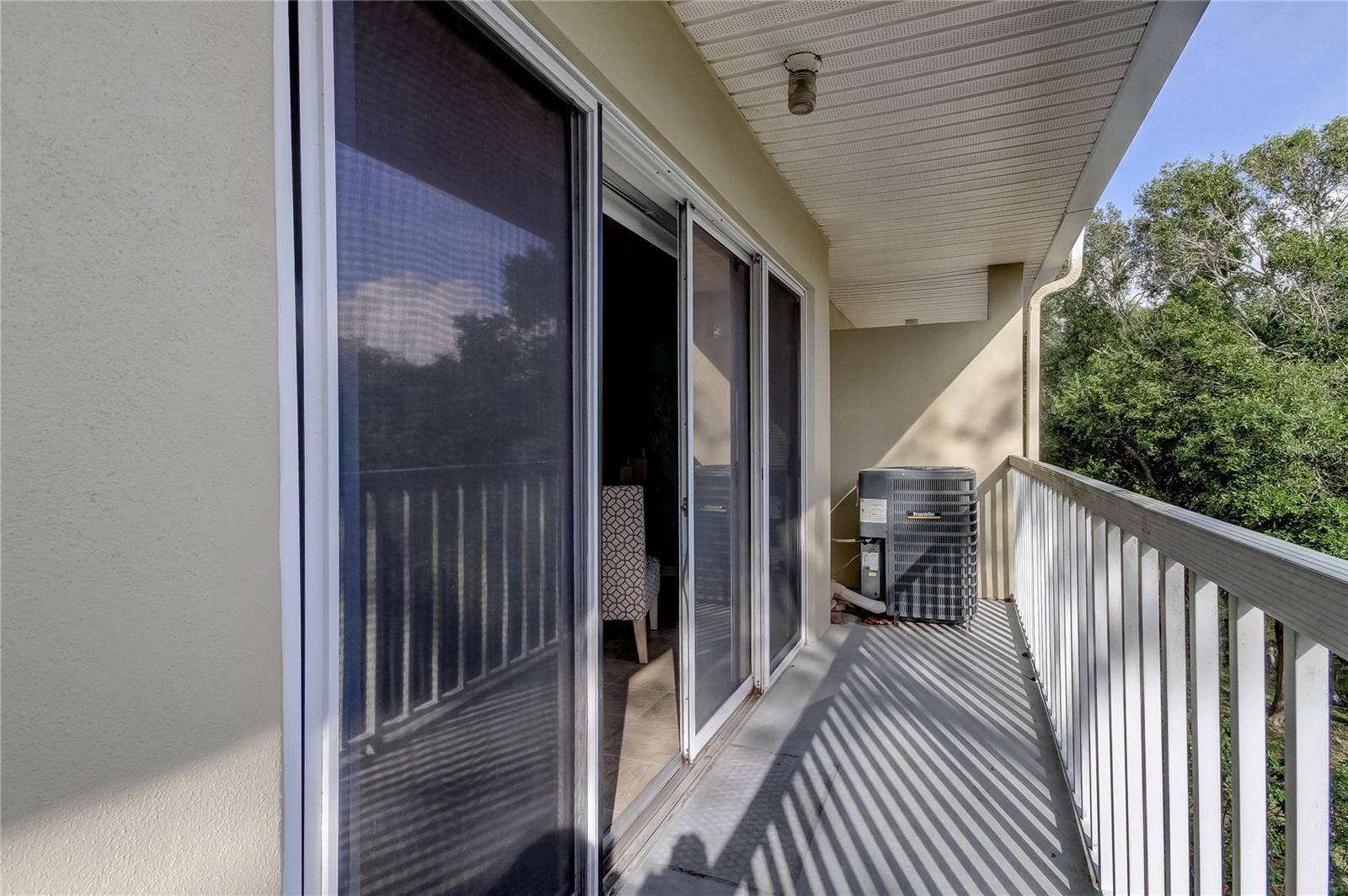 View of balcony off of family room.