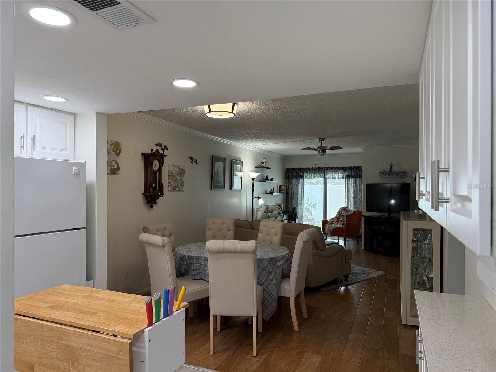 from kitchen looking into dining area/living room