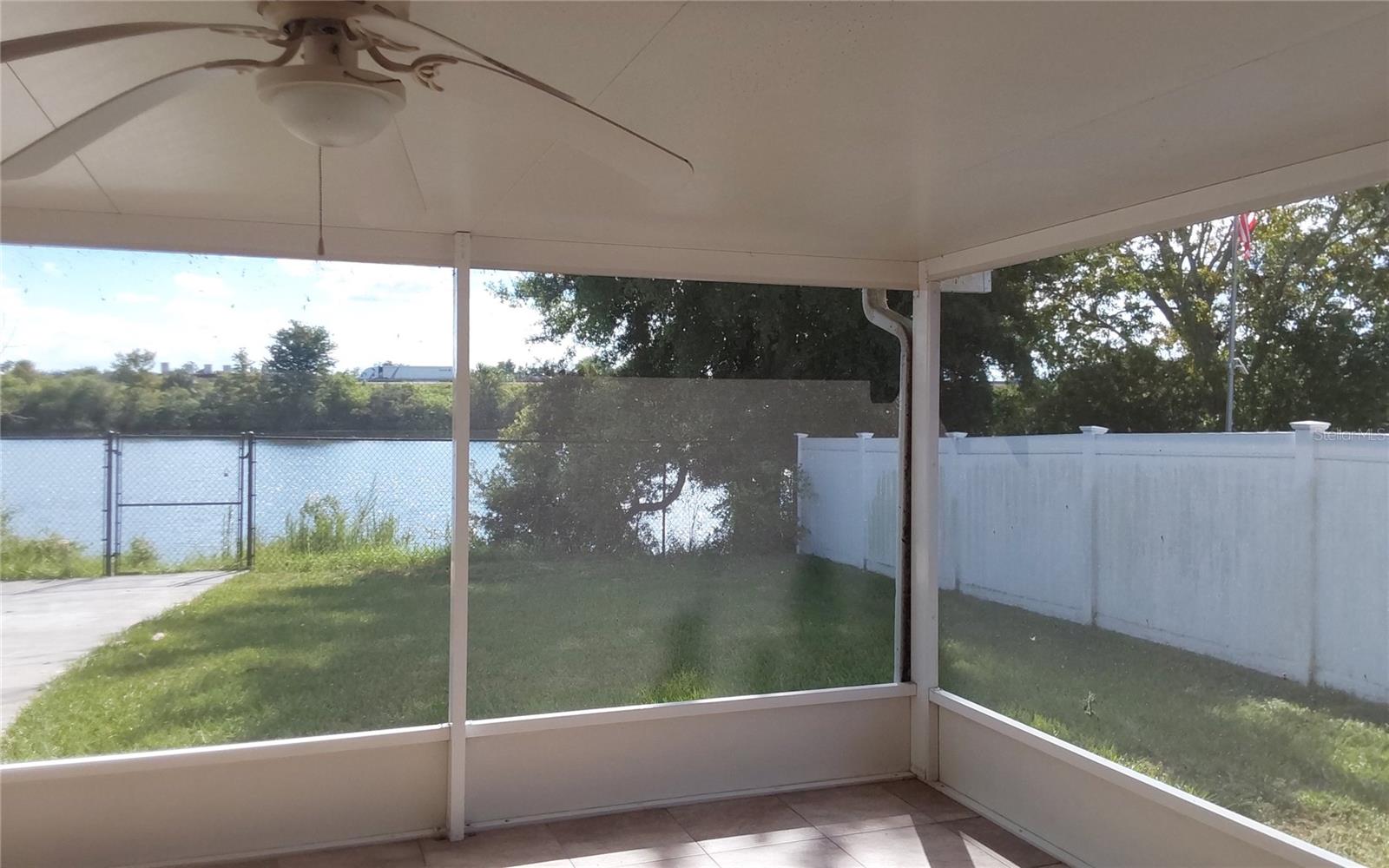 Screened-in covered Porch with the Pond and I-75 view