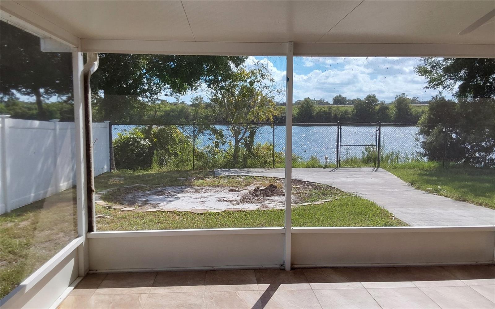 Screened-in covered Porch with the Pond and I-75 view