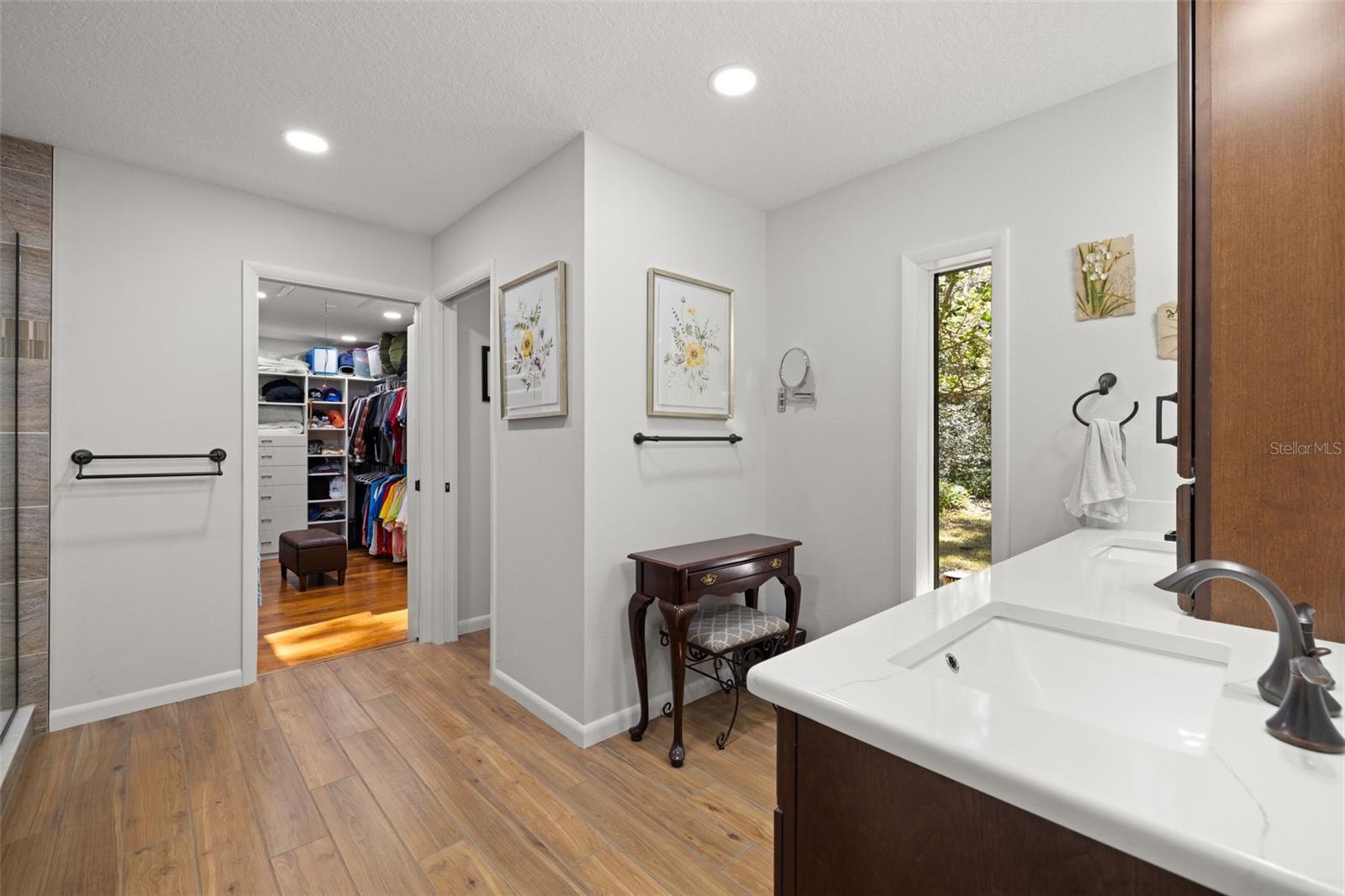 Plank Porcelain Tile & Double Sink Vanity with storage & Quartz Countertops