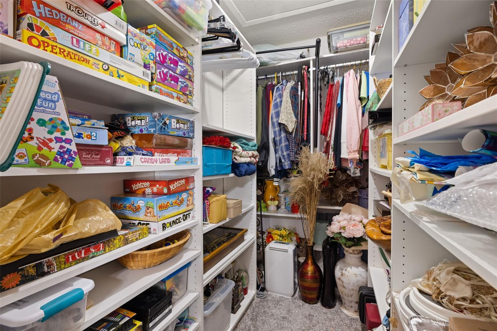 2nd Bedroom Walk-in Closet with Custom Closet Organizers.