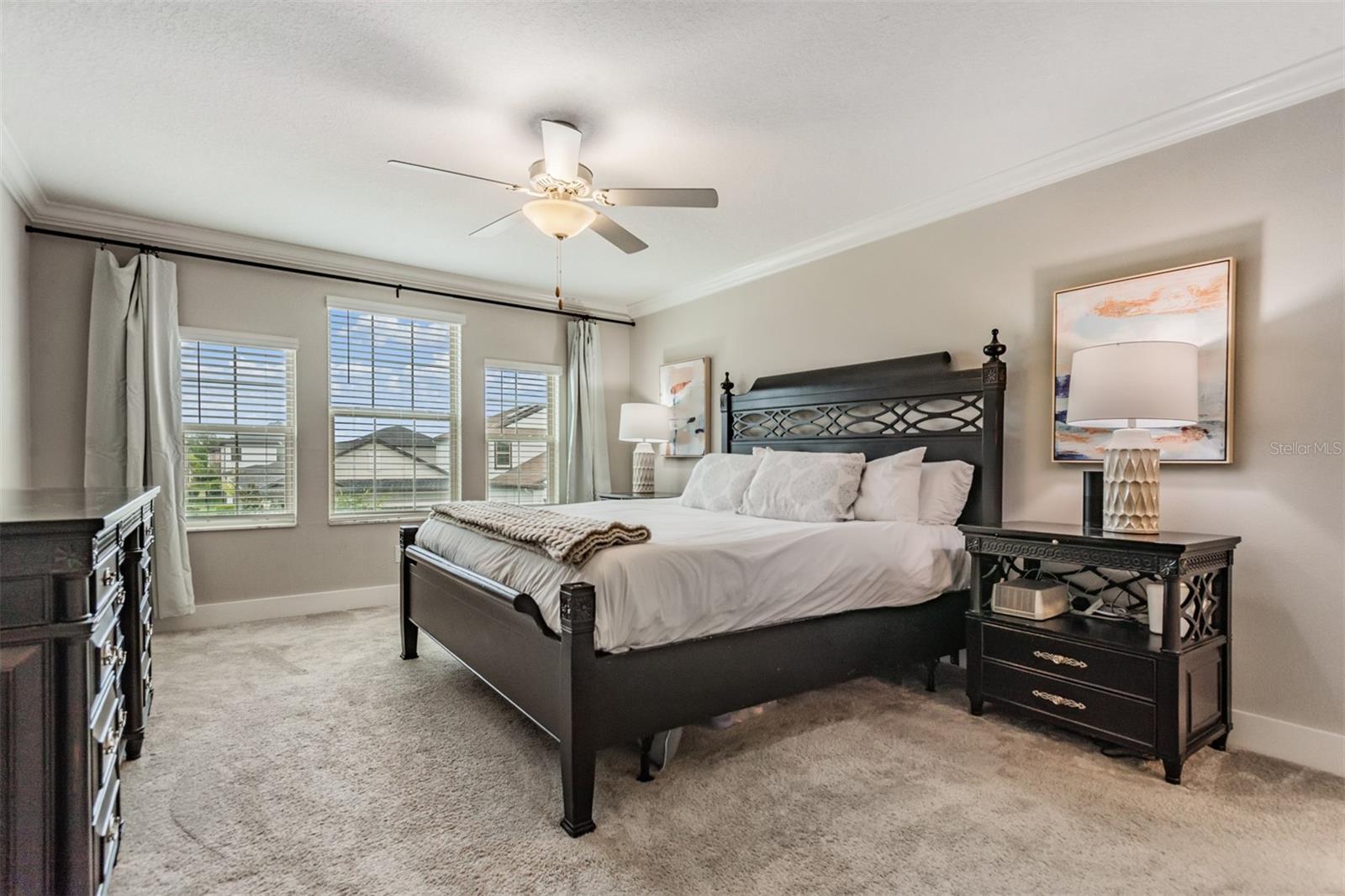 Spacious primary bedroom provides comfort and privacy