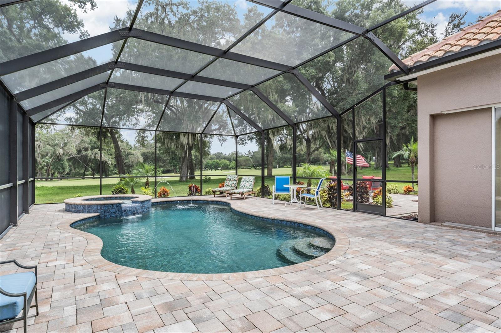 Paver pool deck with Heated pool/spa