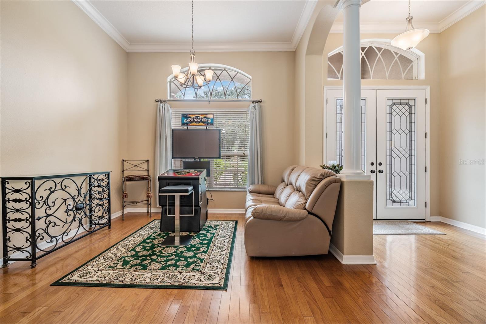 Formal living room with plenty of light