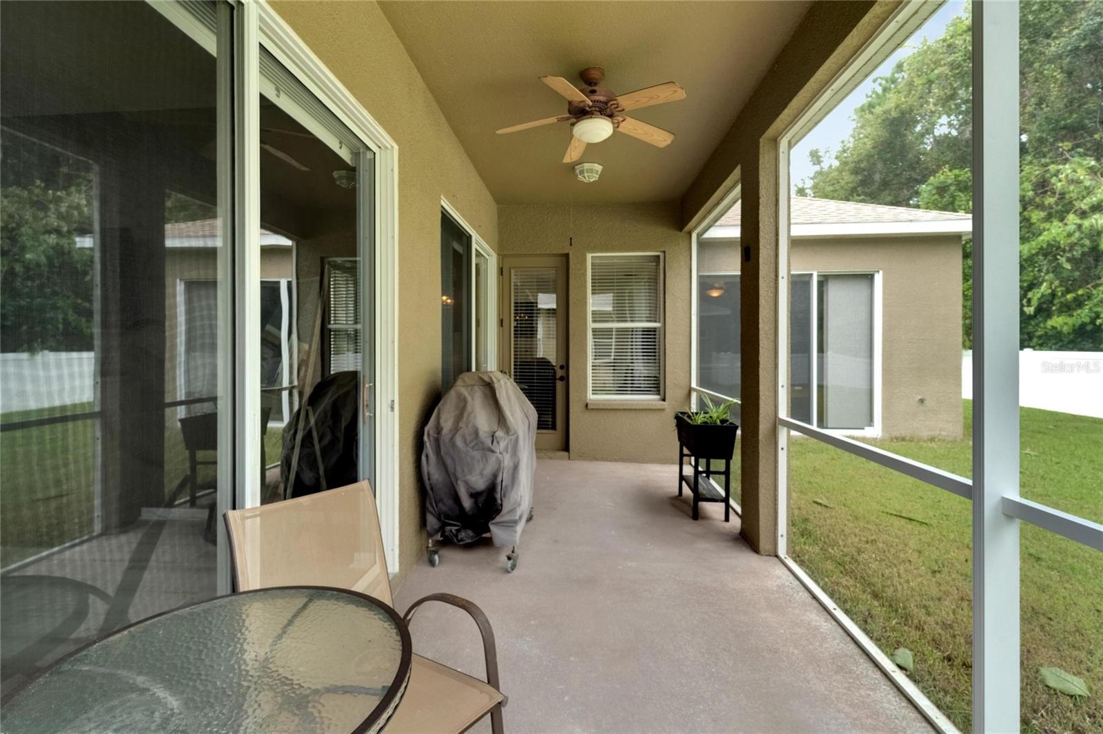 Plenty of room for a table and chairs to enjoy dining outside without the bugs.