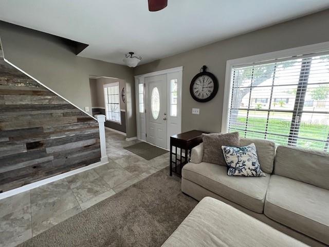 200+ year old wooded accent wall at the entrance