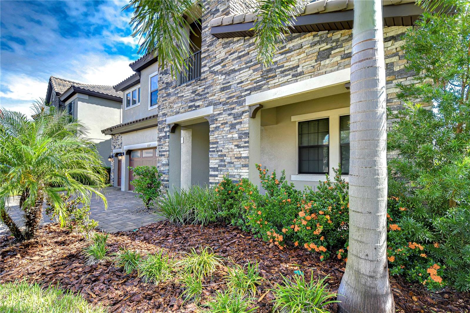 Beautiful curb appeal with well-manicured landscaping!