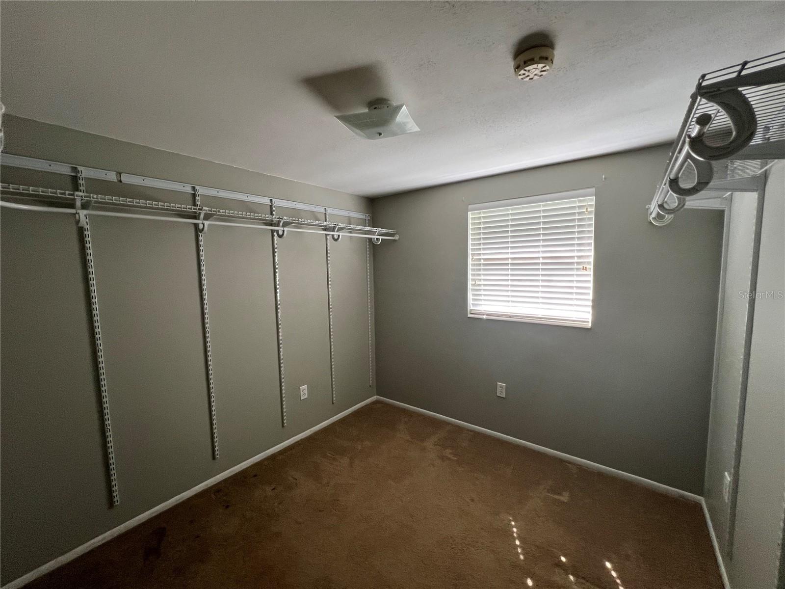 Walk in closet Primary Bedroom - 4043 Burrows RD, Zephyrhills, FL