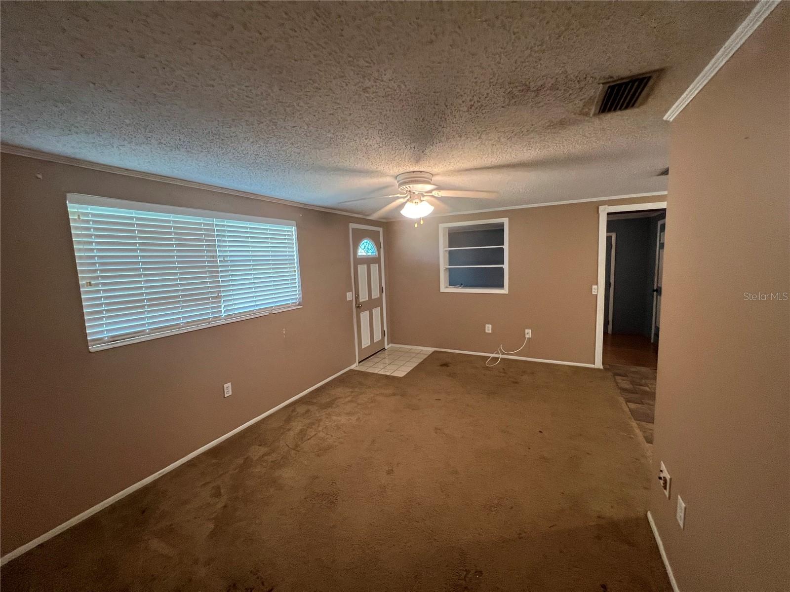 Second view of Living Room - 4043 Burrows RD, Zephyrhills, FL