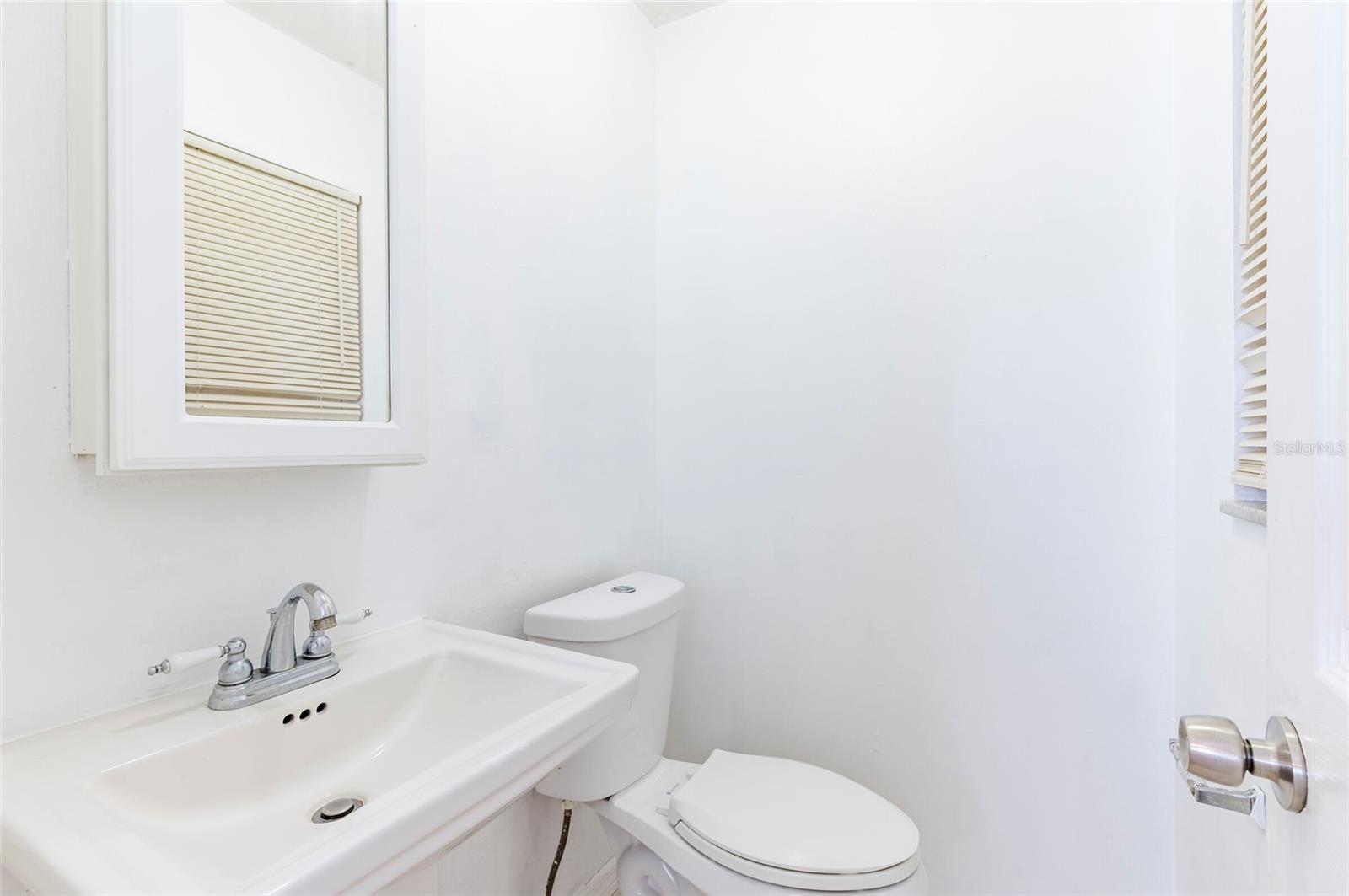 half bath in primary bedroom