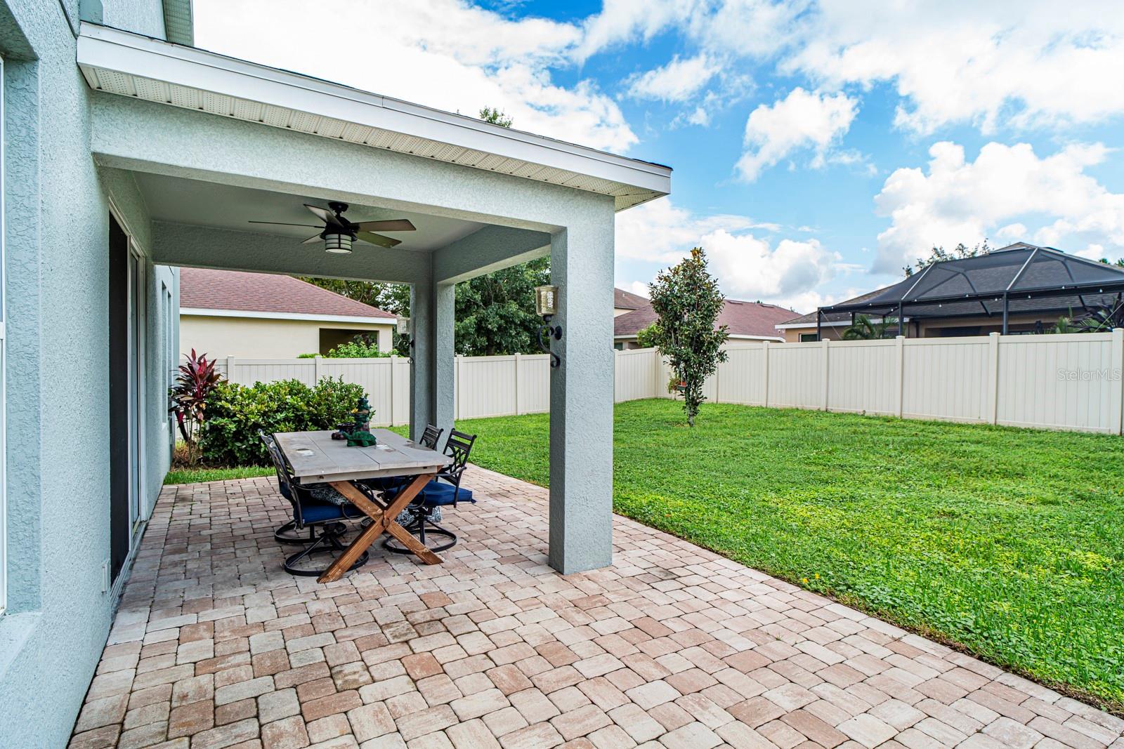 Fully fenced backyard and lanai