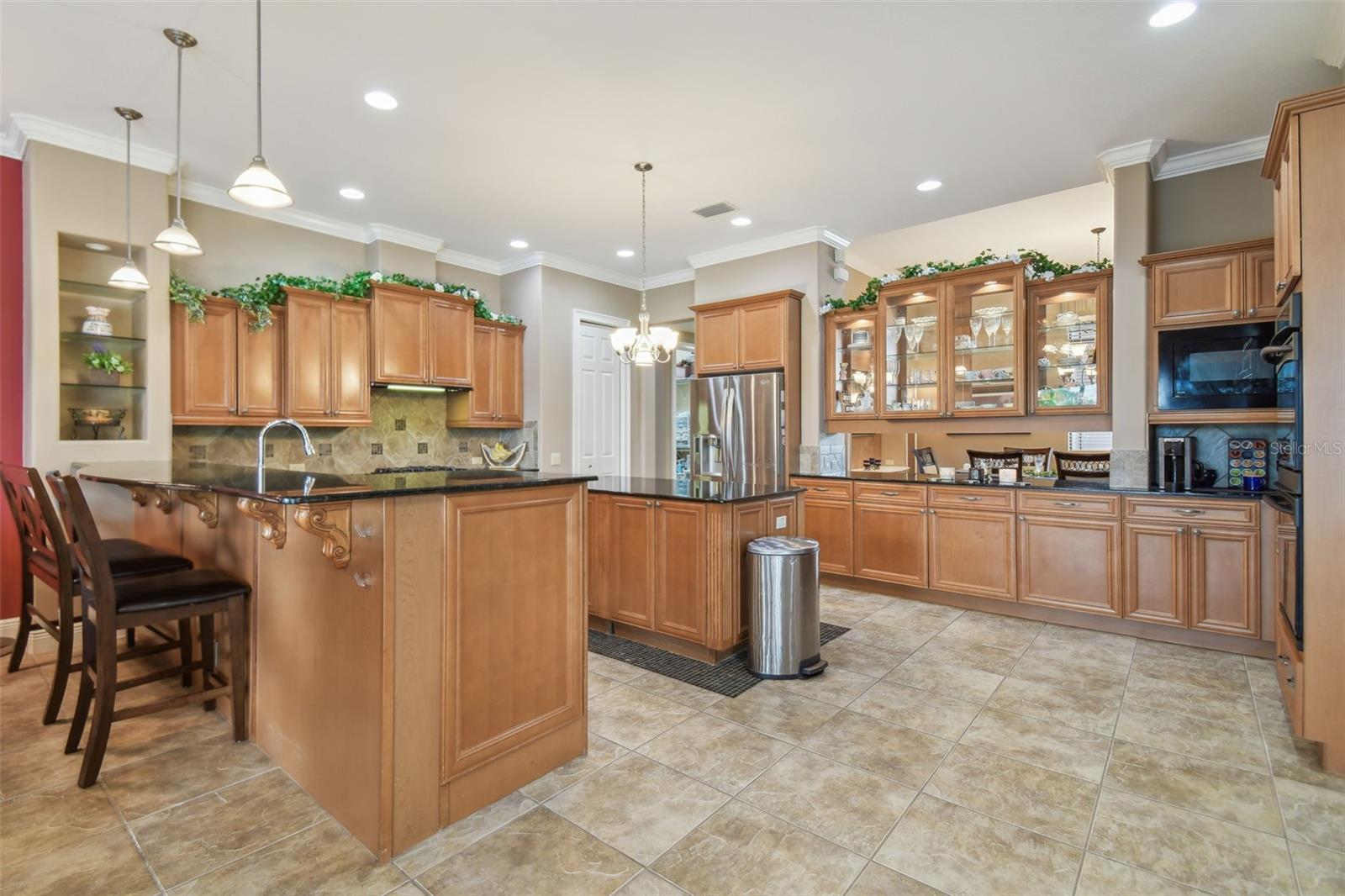 Gourmet kitchen with island.