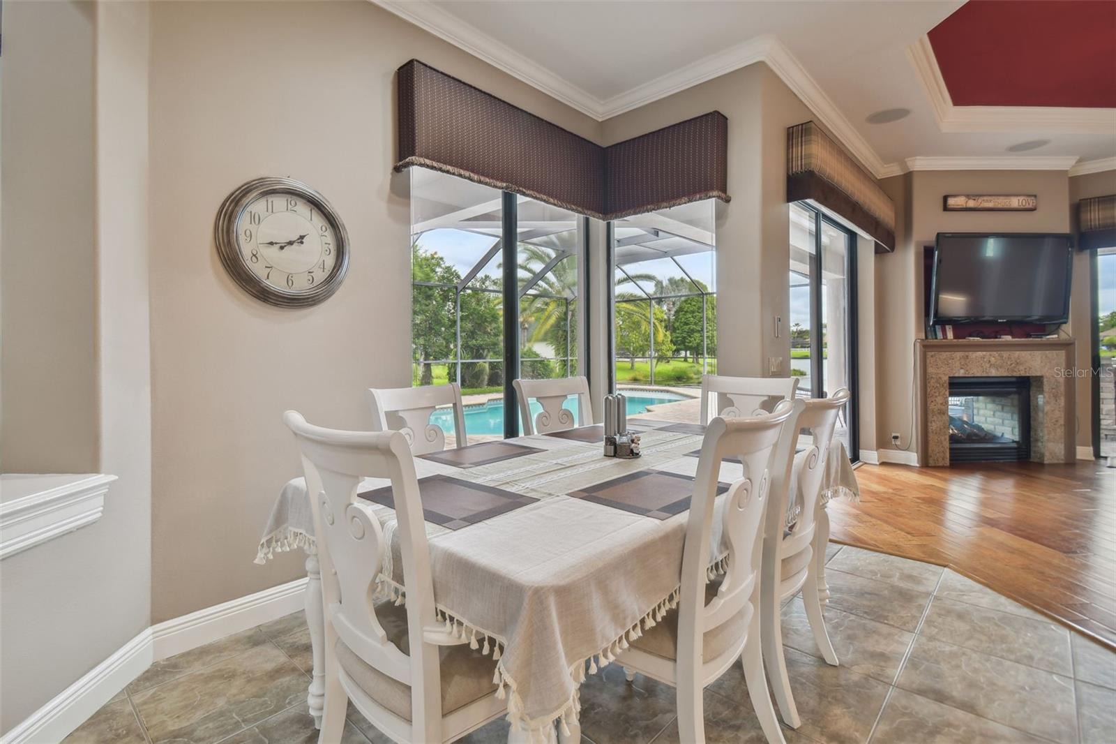 Breakfast nook with pool and pond views.