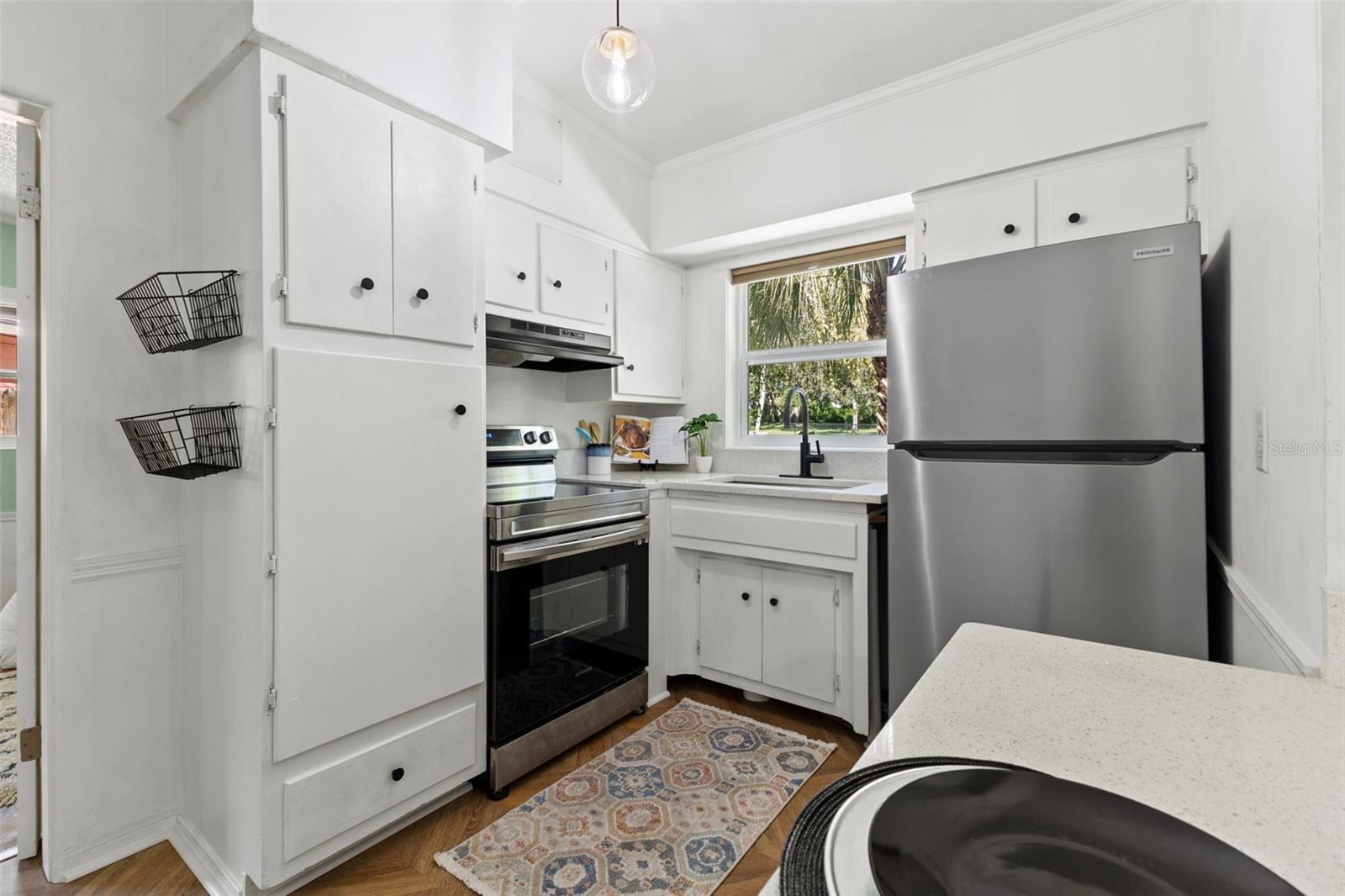 Kitchen with stainless steel appliances.