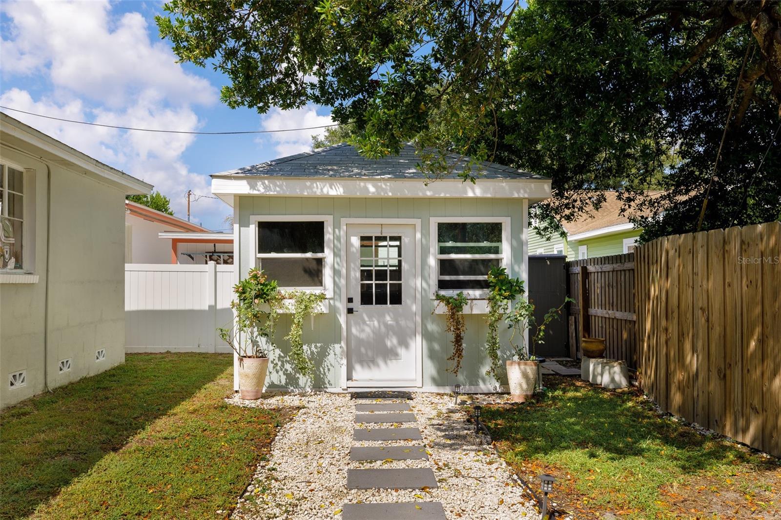 Brand new shed with washer & dryer inside, and additional storage.