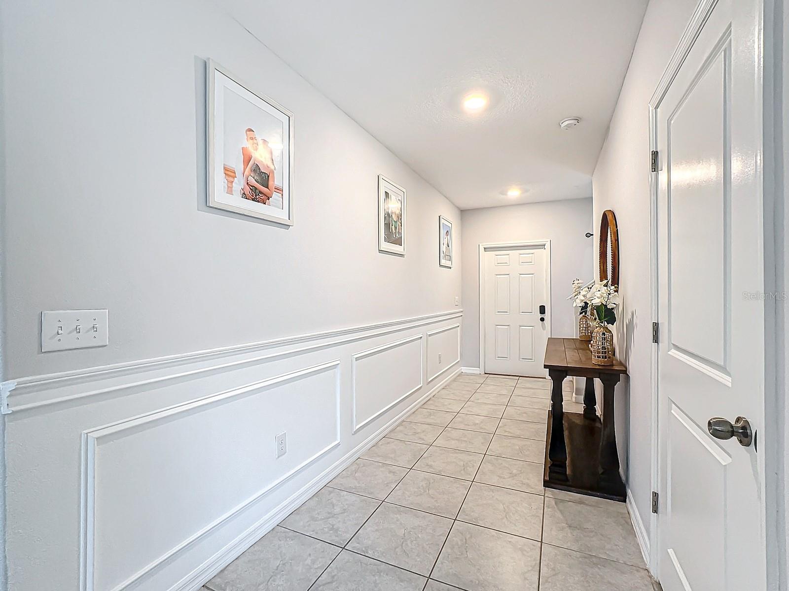 Foyer with Wainscoted Wall