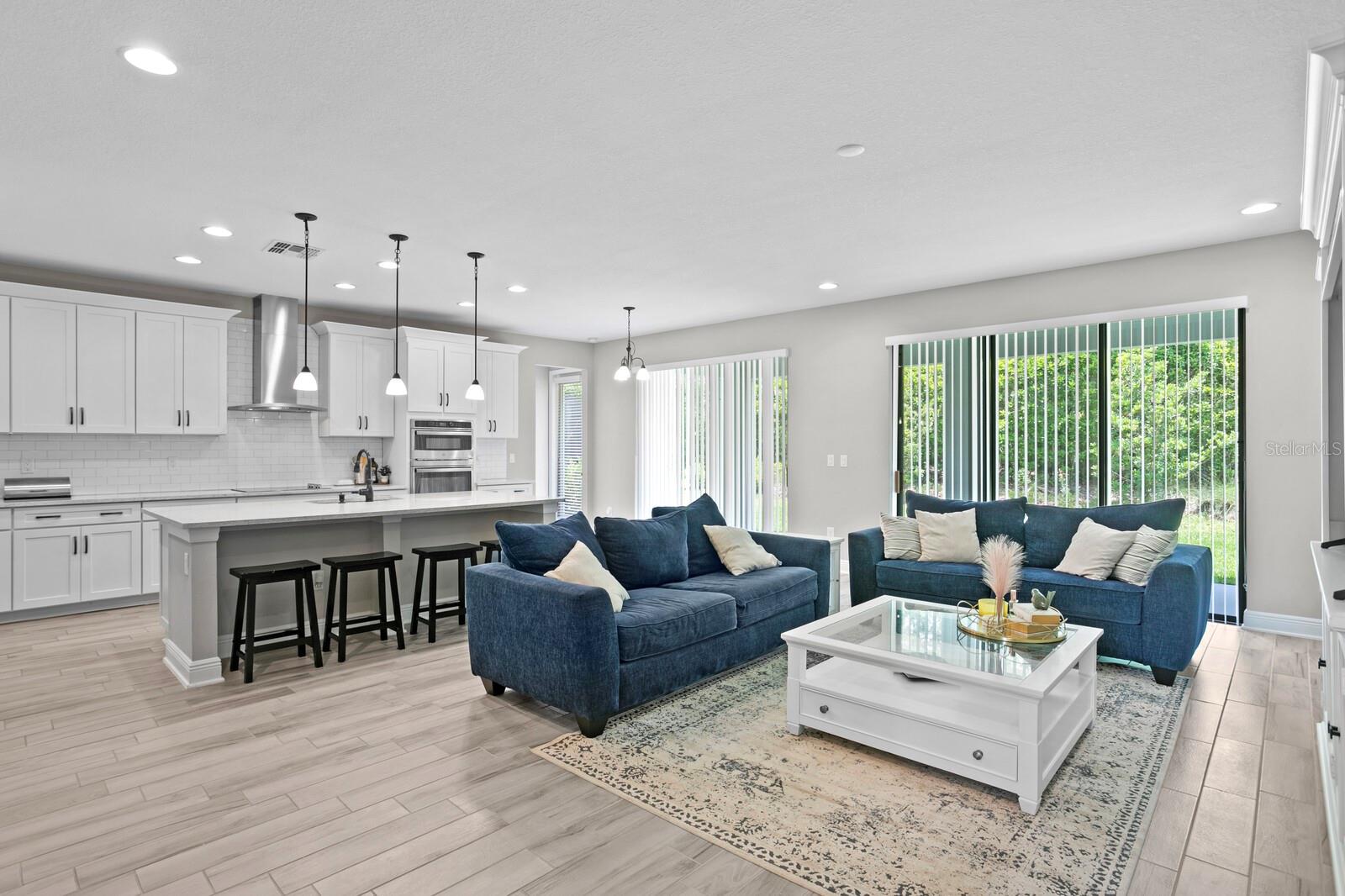 Sliding glass doors bring in tons of light and access to the backyard.