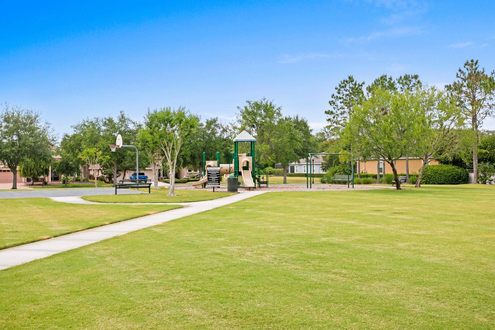 Park view offers no front neighbors, expansive greenspace.