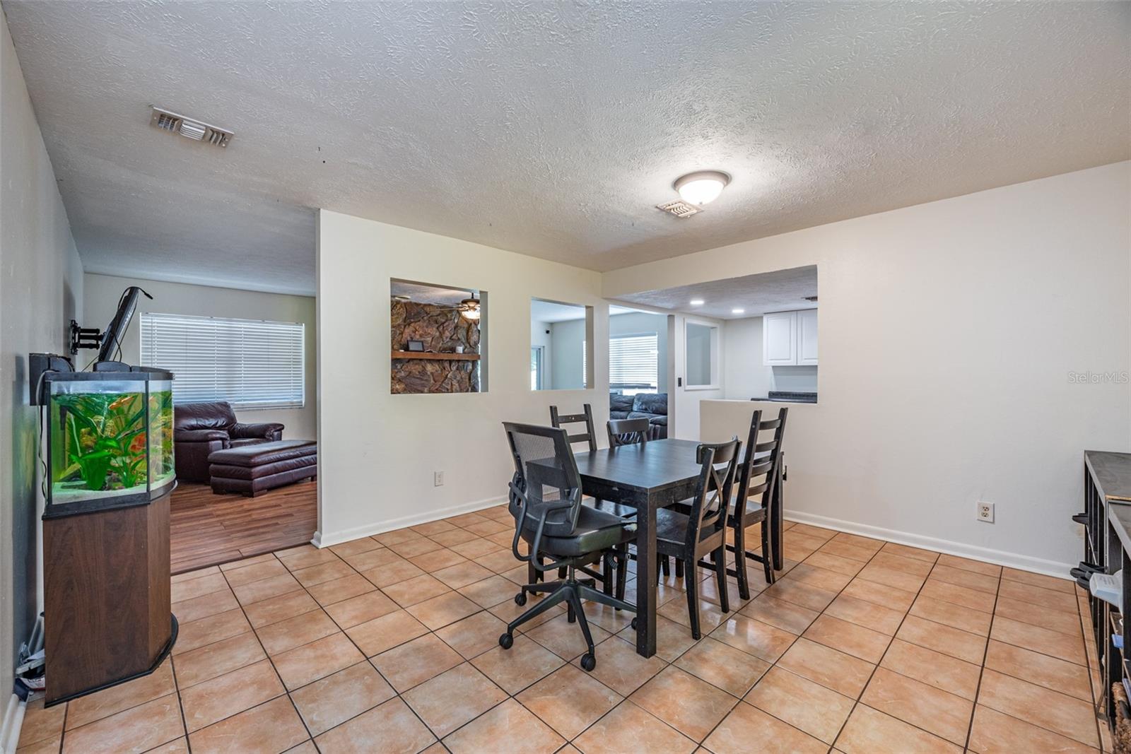 Dining room has open sight lines into the Living room and kitchen.