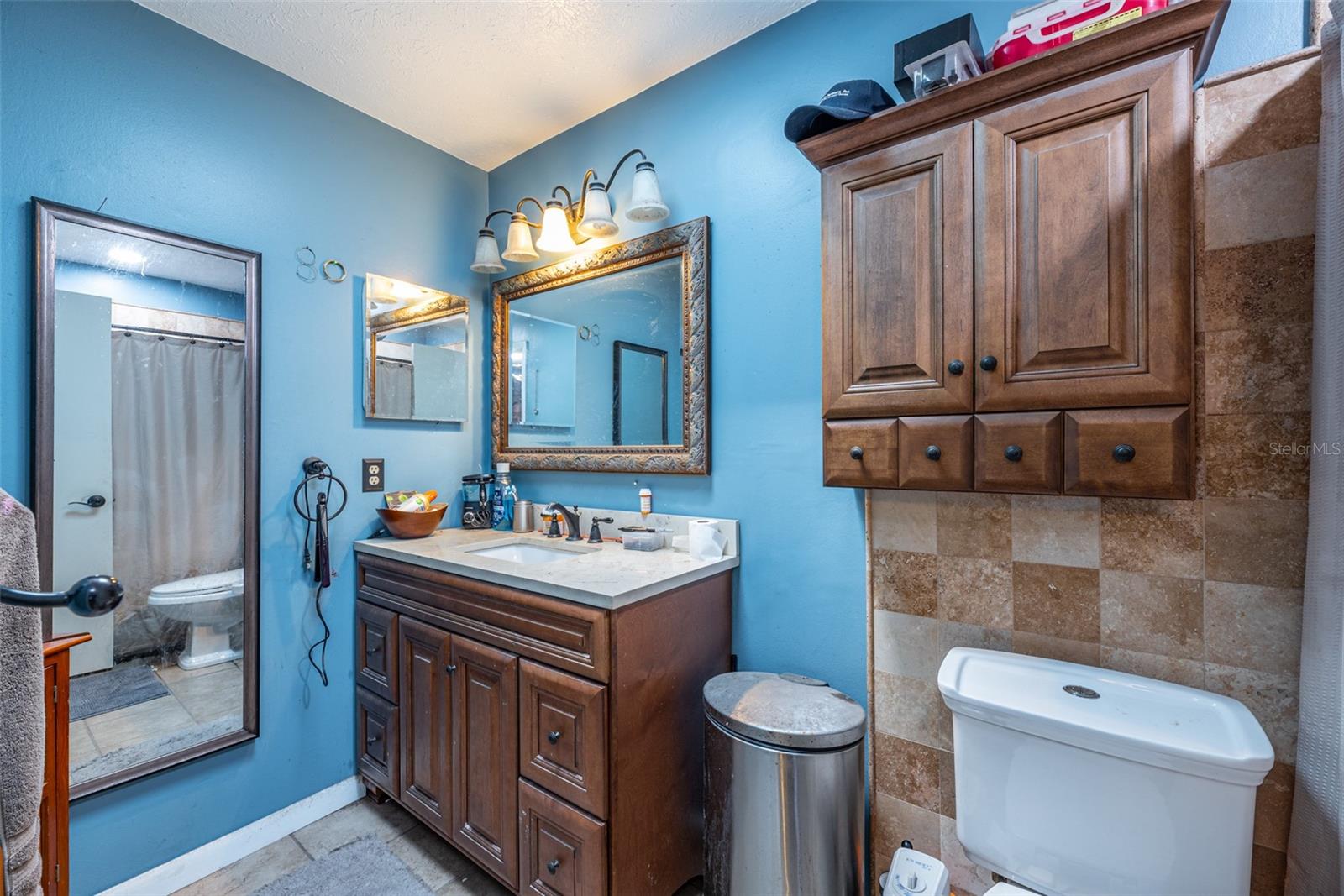 The owner's ensuite has an upgraded shower, vanity and fixtures.