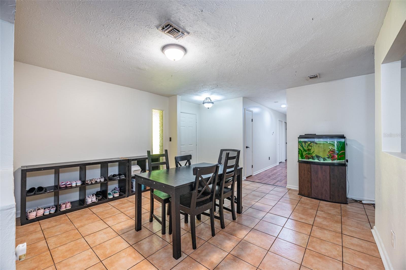 Enter the front door into the Dining room.