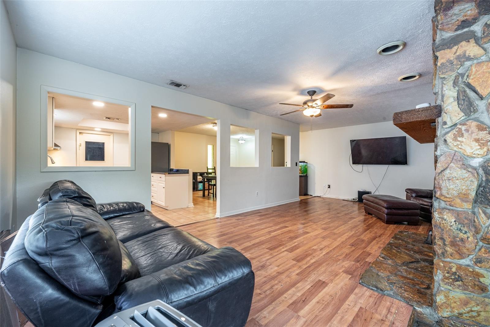 Dining room has open sight lines into the Living room.