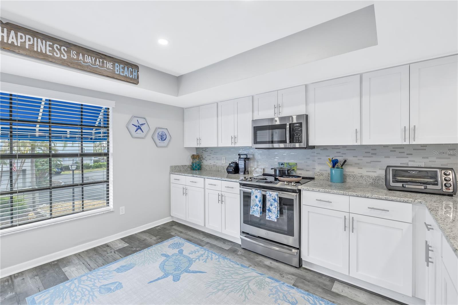 renovated kitchen with added backsplash