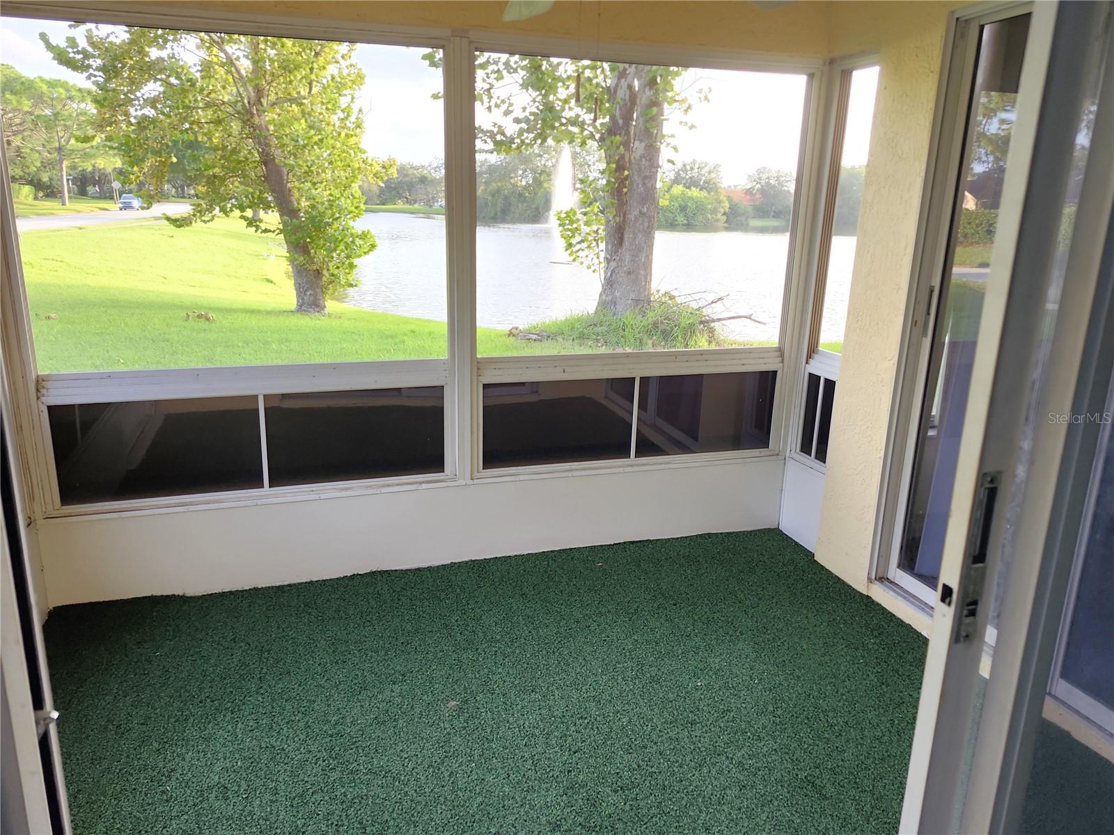 Screened In Patio Overlooking Pond