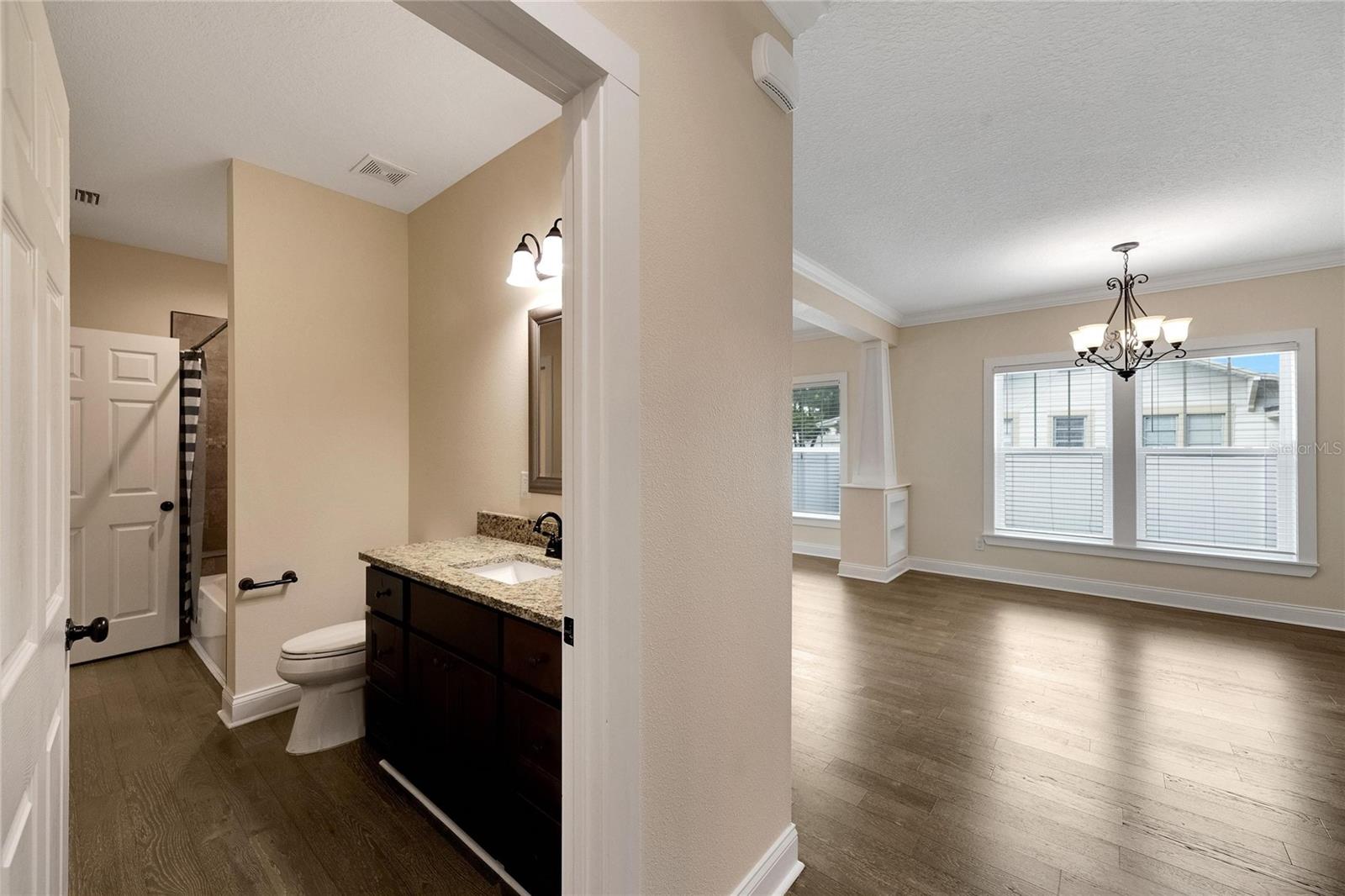 Hall view of dining area and Jack and Jill bathroom