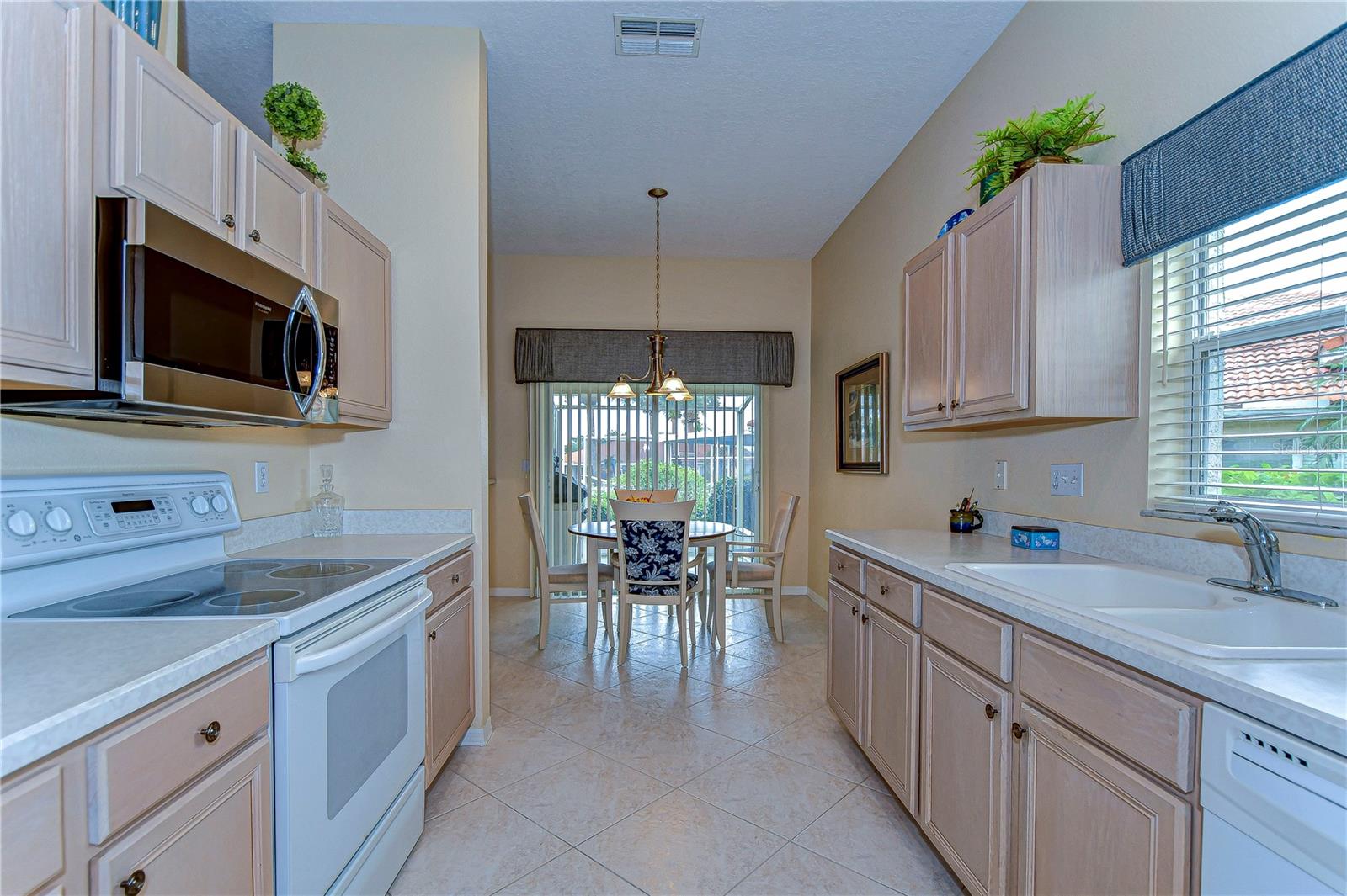 Wood cabinets, ample storage and prep space!