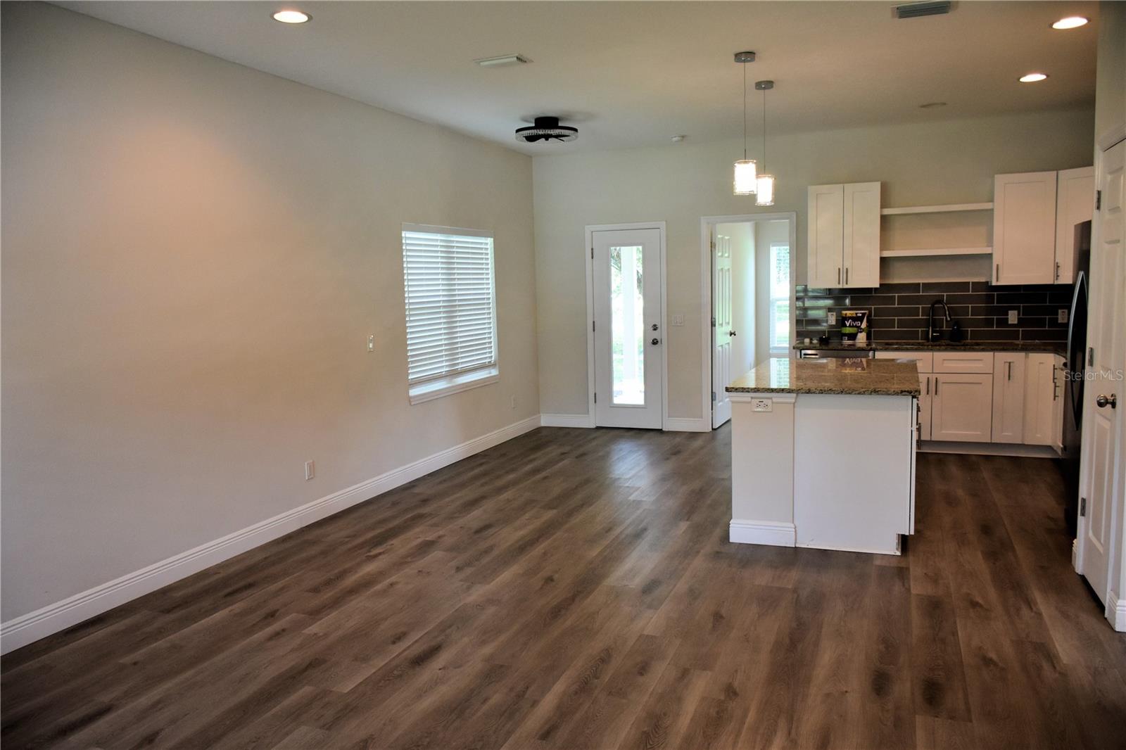 Great room open to kitchen and dining area