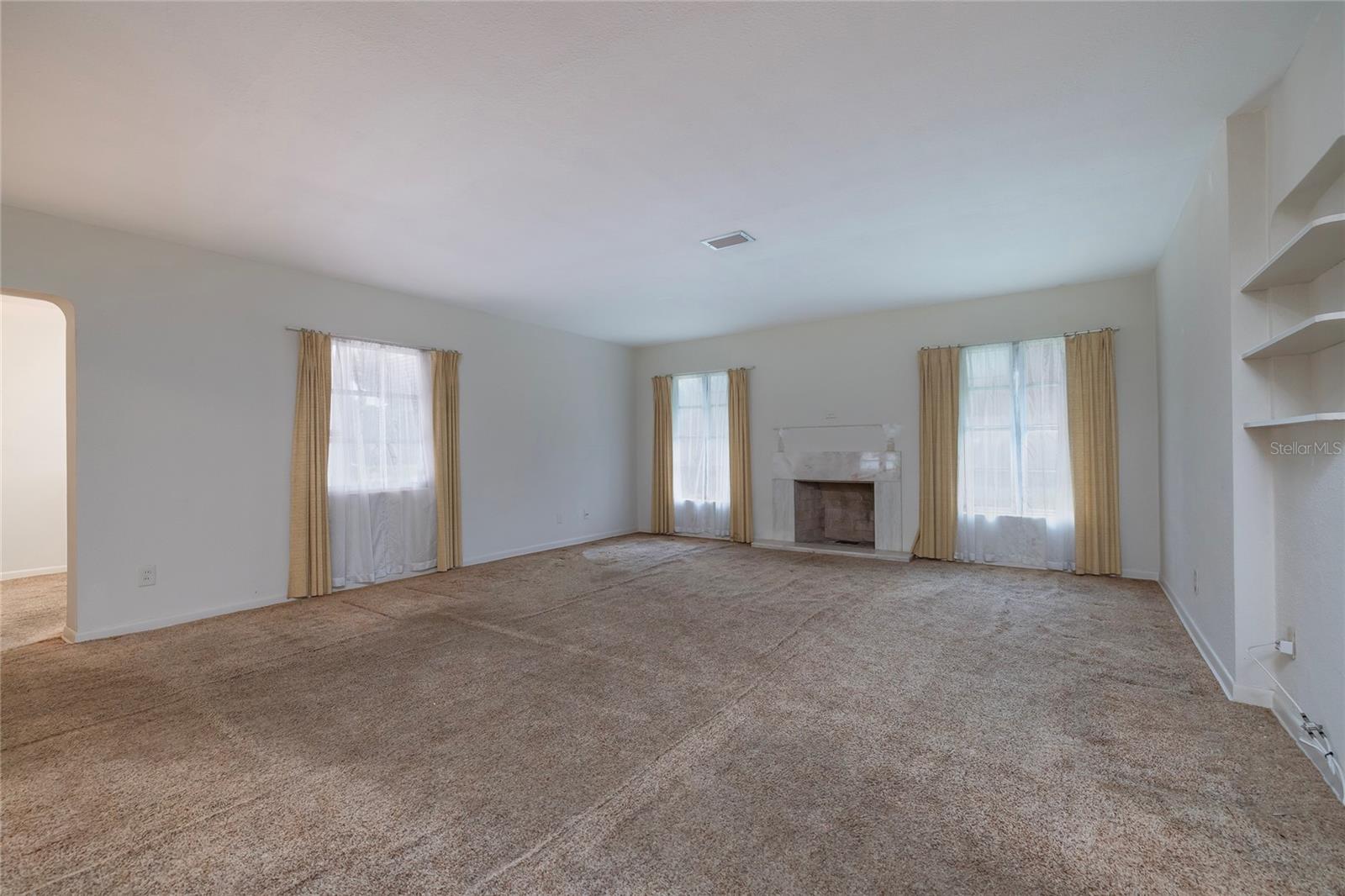 Living Room with wood-burning fireplace