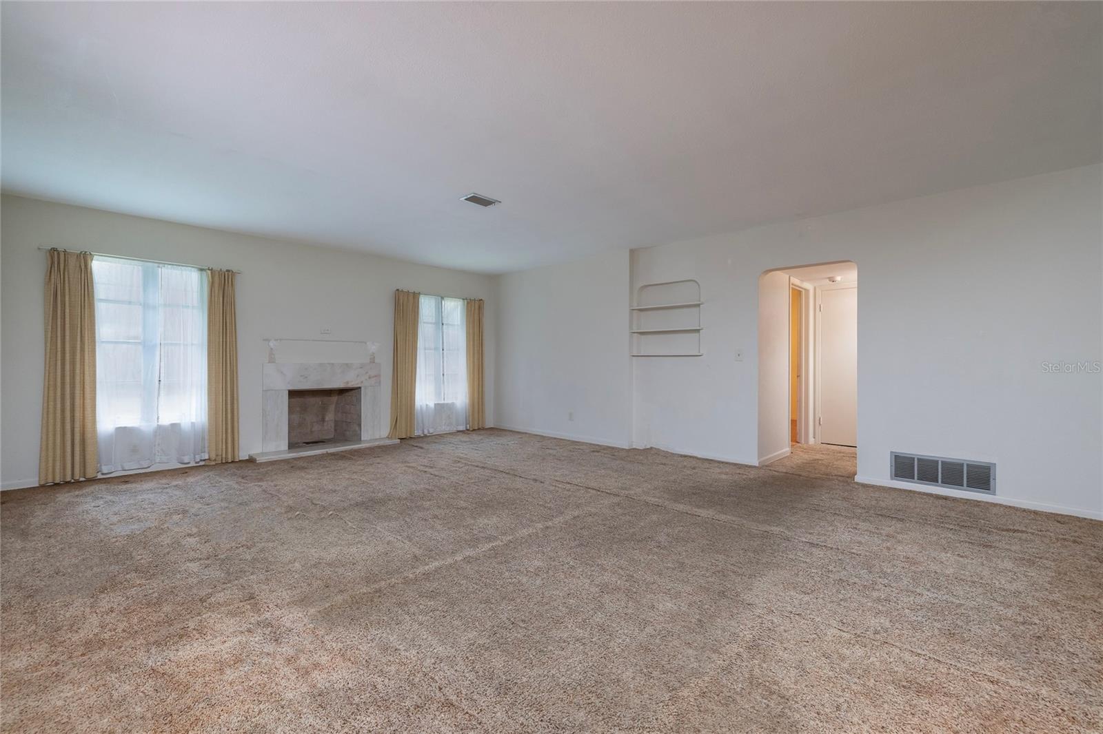 Living Room with wood-burning fireplace