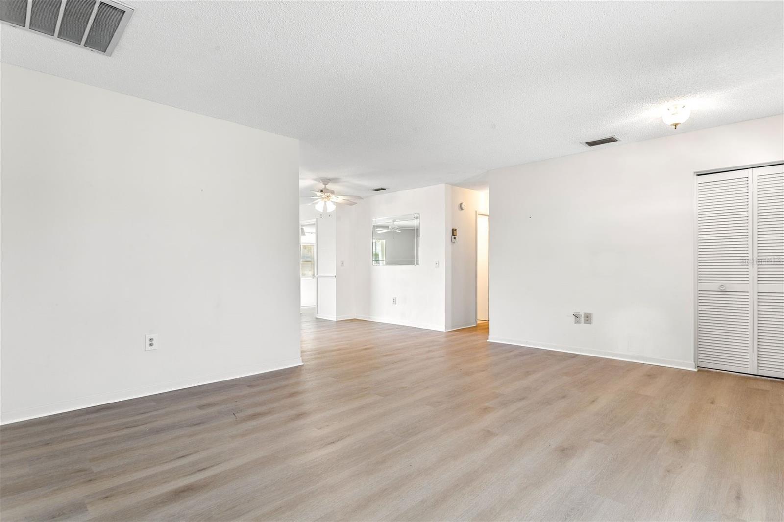 Living Room towards Dining Area and Hallway