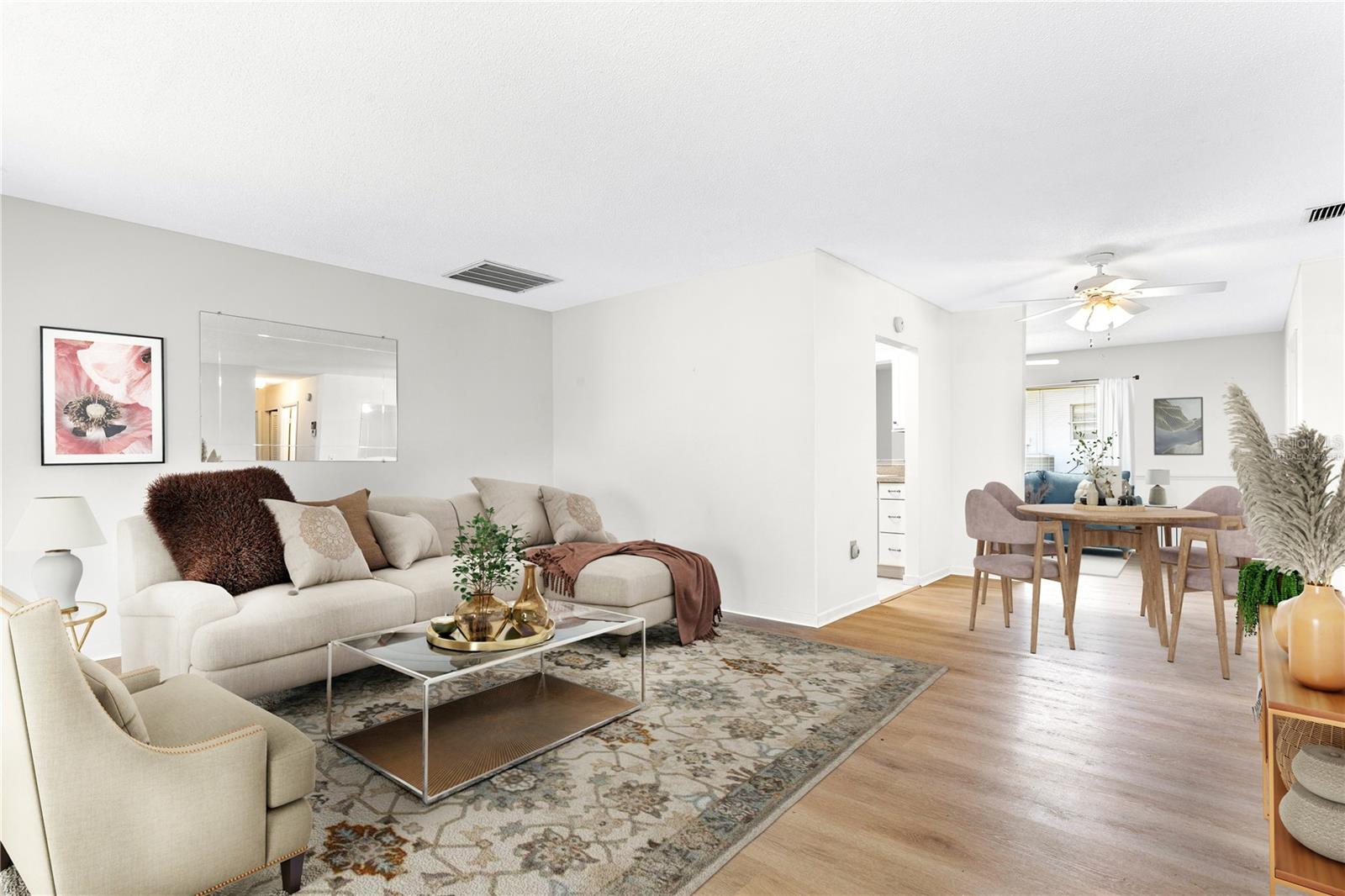 New Luxury Vinyl Floors make this cozy and comfortable area Shine!  Virtually Staged