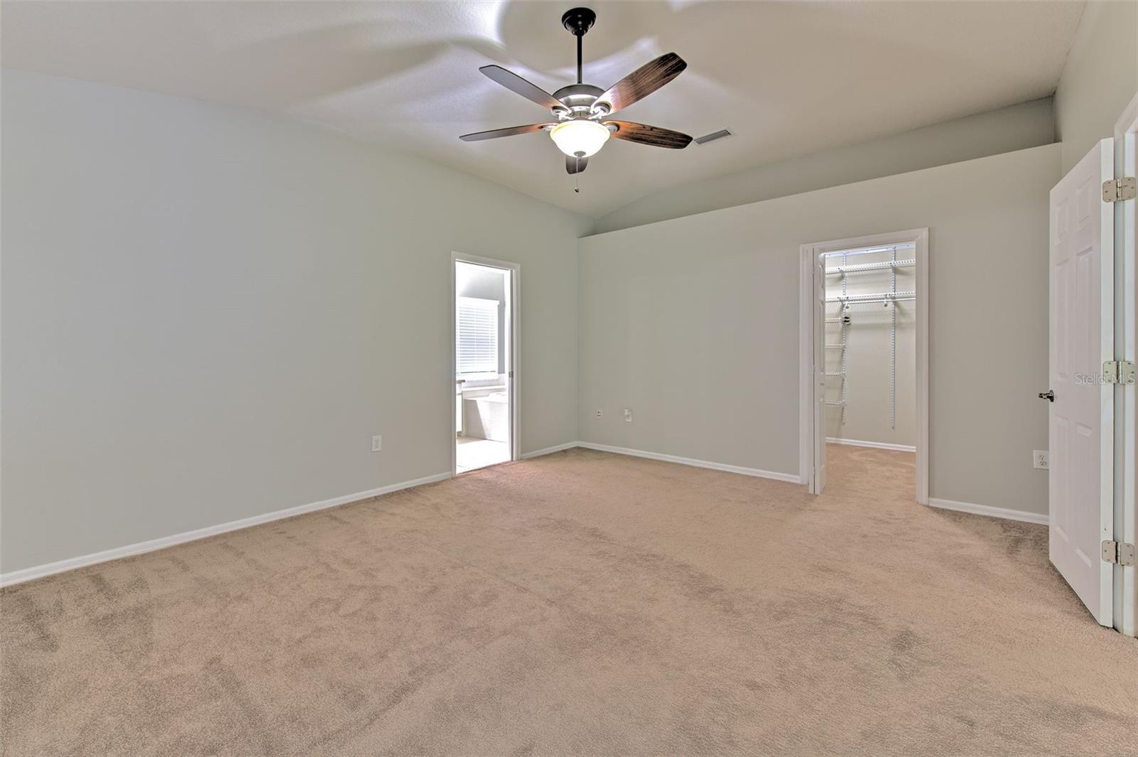 Primary Bedroom and Walk-in Closet