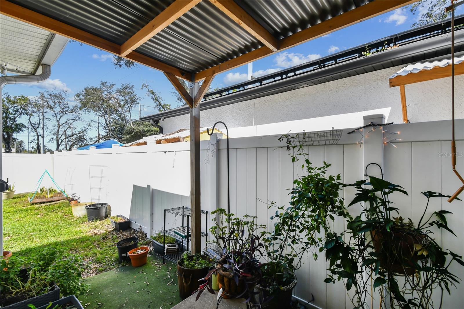 Right side Patio area, leading to backyard.