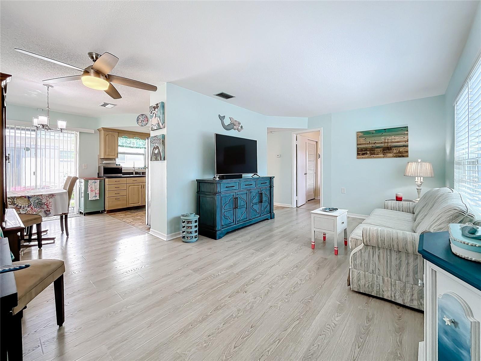 Nice open floor plan showing the living room and part of the kitchen