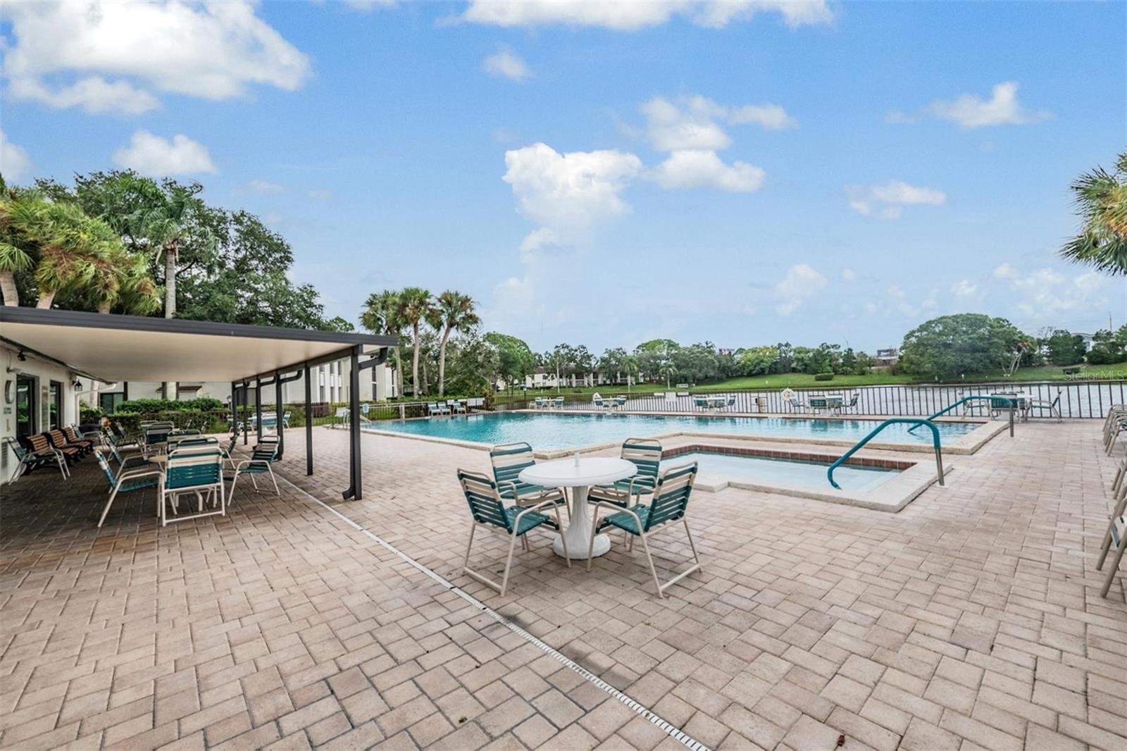 Enjoy the sparkling pool, basking in the sun or sitting in the shade with neighbors