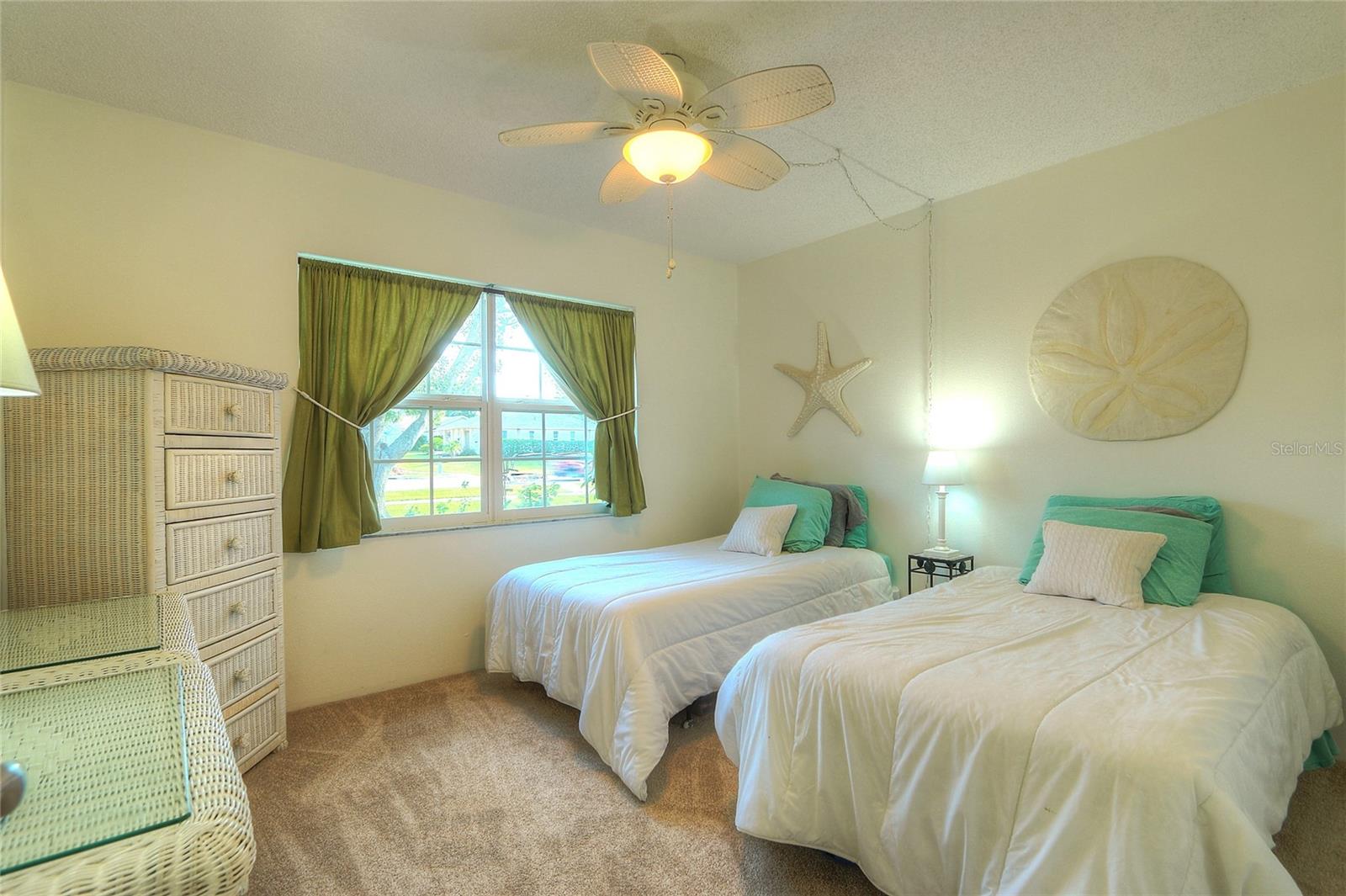 Guest bedroom - also light and bright.