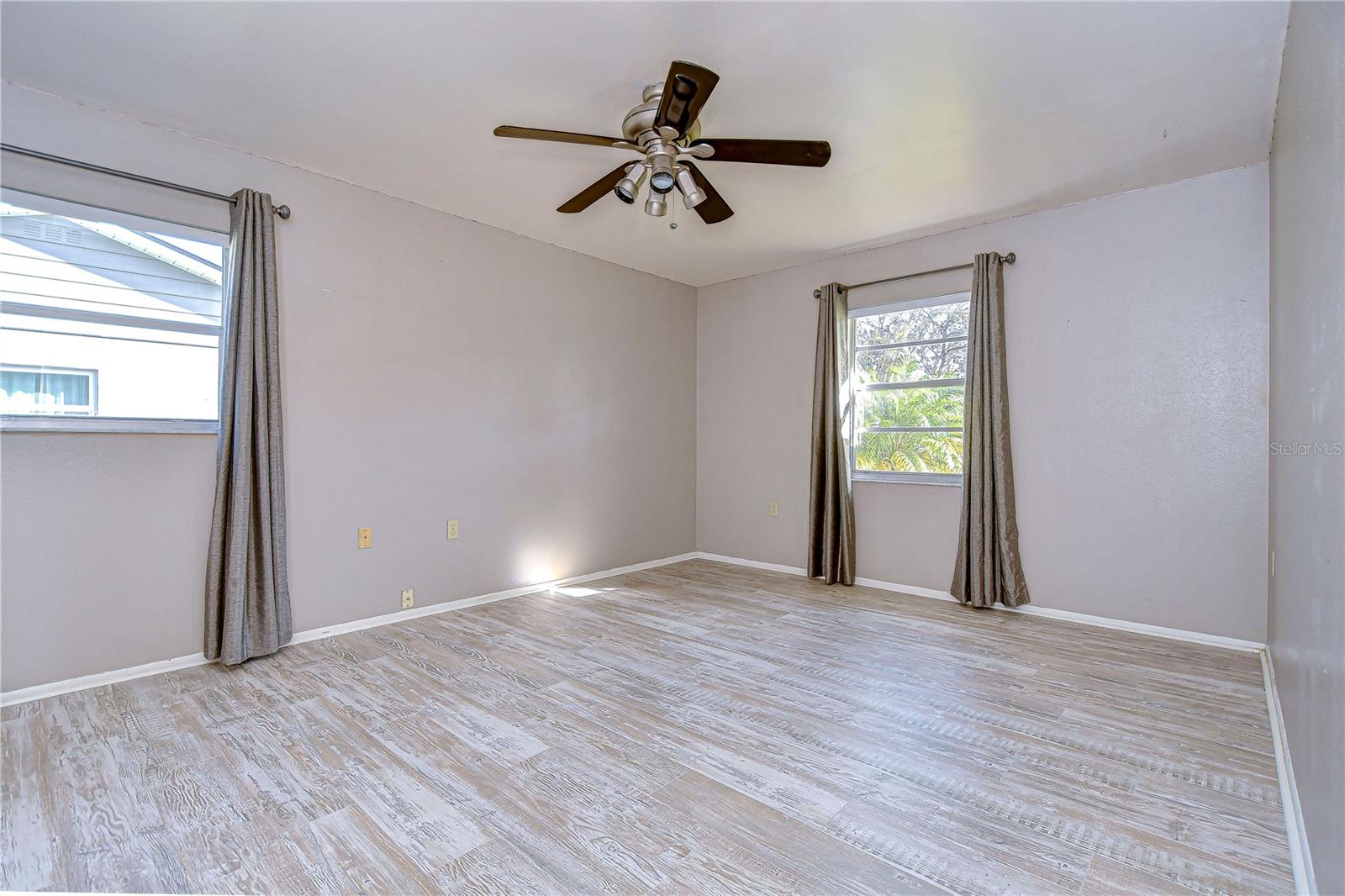 Owner's Bedroom With Newer Laminate Flooring