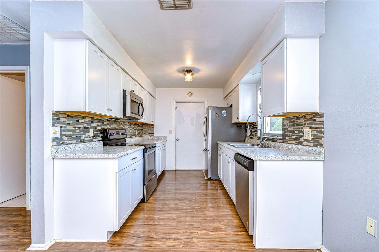 Upgraded Kitchen With Stainless Steel Appliances